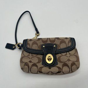 21. Coach Brown Signature Turn Lock Wristlet